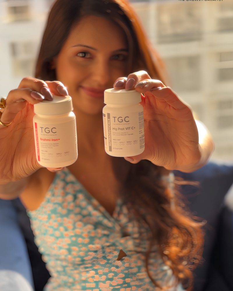 Nibedita holding two Trichocycle Matrix bottles